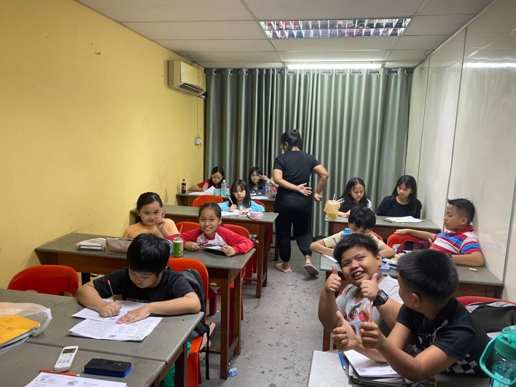 Children working on a classroom puzzle activity