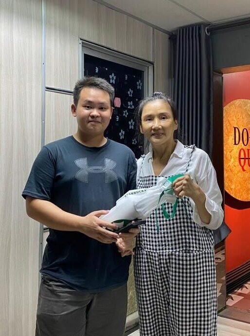 Secondary student being presented with achievement award