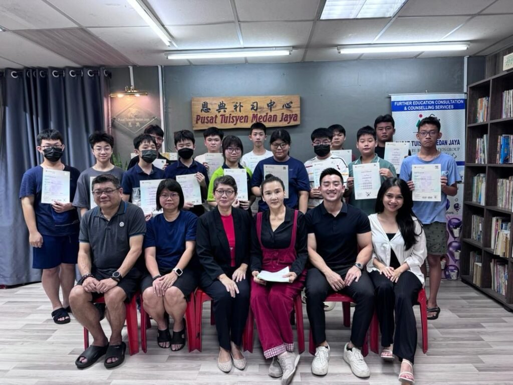 Parent and child celebrating Cambridge exam achievement